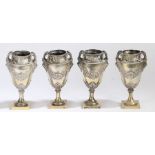 A fine set of four Hanau silver vases, import mark for Boaz Moses Landeck, Chester 1908, the