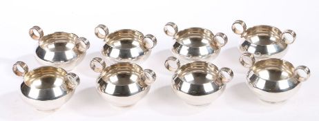 A set of eight Elizabeth II silver twin handled bowls, London 1971, maker Leslie Gordon Durbin (
