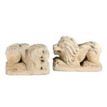 An interesting pair of late 16th century limestone carved recumbent lions, circa 1600 Each with open