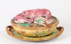 A Majolica lobster tureen and stand by George Jones, Circa 1880. Tureen and stand both decorated