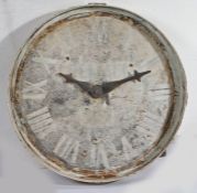 An early 20th century French metal clock face, the dial with Roman numerals and feint French