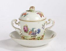 A 19th century Meissen twin-handled chocolate cup & cover with trembleuse saucer, hand painted