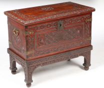 A 19th Century cedar coffer, possibly Indonesian, the hinged lid with diamond carved decoration