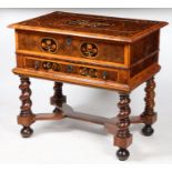 A William and Mary oyster veneered and marquetry inlaid side table, the hinged top with foliate