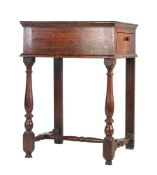 An unusual William & Mary oak side table, circa 1700, having a boarded top with linear inscribed