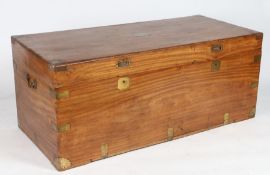 A Victorian camphor wood campaign chest, the hinged lid with recessed handles, brass corner mounts