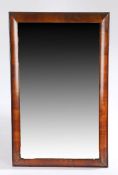 An 18th century walnut cushion-framed wall mirror, with rectangular bevelled-glass plate, 44cm wide,