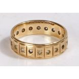 9 carat gold and paste eternity ring, the ring set with round cut stones (some missing), stamped