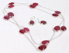 Silver and red faceted stone necklace and earring set, formed of pear shaped faceted red stones