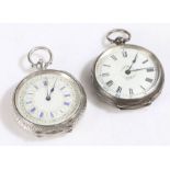 Two continental silver pocket watches, one with a white dial and blue Roman numerals with an