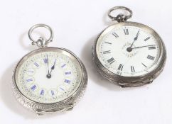 Two continental silver pocket watches, one with a white dial and blue Roman numerals with an