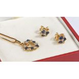 9 carat gold diamond and sapphire heart shaped pendant and chain together with a pair of earrings,
