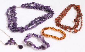 Collection of various beaded necklaces and bracelets, to include a large three strand amethyst