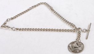 Silver Watch chain and T bar together with a silver pendant of a Viking Longship, weight 35.2 grams