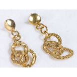Pair of 18 carat gold drop earrings, formed of oval interlocked pieces, stamped 750, weight 2.4