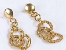 Pair of 18 carat gold drop earrings, formed of oval interlocked pieces, stamped 750, weight 2.4