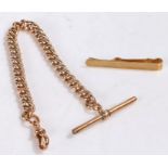 9 carat gold pocket watch chain and T bar together with a 9 carat gold tie clip, gross weight 14.4