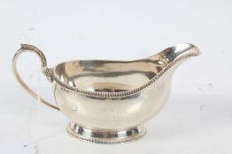 Modern silver sauce boat, Birmingham 1966, with beaded rim and foot, 6oz