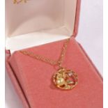 14 carat gold diamond a pearl pendant depicting a palm tree together with a 14 carat gold chain link