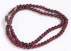 Garnet bead necklace, set with spherical garnet beads, 42cm long