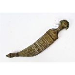 Arab Jambiya, steel curved blade with midrib, white metal Hoeida style hilt, held in ornate white