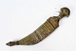 Arab Jambiya, steel curved blade with midrib, white metal Hoeida style hilt, held in ornate white