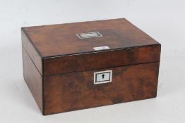 A Victorian walnut and mother of pearl sewing box, the top set with rectangular mother of pearl