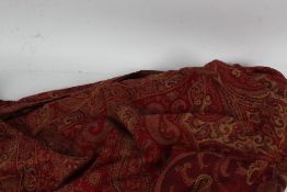 A paisley pattern shawl, the red ground set with gilt pattern decoated with boteh and floral design,
