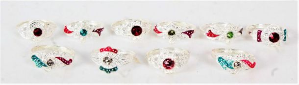 Ten white metal costume rings, set with various stones, gross weight 15.2 grams