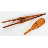 Late 19th/Early 20th century treen glove stretcher and needle case (2)