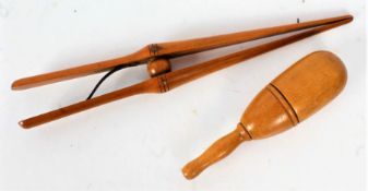 Late 19th/Early 20th century treen glove stretcher and needle case (2)