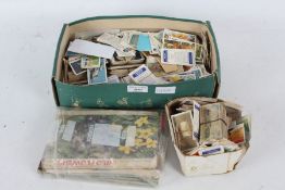 A Large collection of cigarette cards to include Wills Cigarette cards and and brooke bond (Qty)
