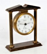 Swiza 7 jewels clock, with brass architectural frame, 8.5cm wide
