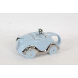 An Art Deco Sadler novelty tea pot in the form of a racing car in blue and chrome, marks to base,