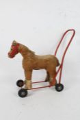 Lines Brothers push-along baby walker, in the form of a horse, original label to underside
