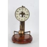 Bulle electric mantel clock, the white dial enclosing a skeletonised centre, with a cylindrical