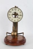 Bulle electric mantel clock, the white dial enclosing a skeletonised centre, with a cylindrical
