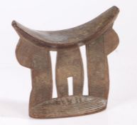 Ethiopian Oromo headrest, with incised decoration on three supports, oval base, 19.5cm wide, 18.