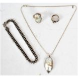 Collection of silver and white metal jewellery, to include a mother of pearl pendant with 925 silver