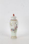A 20th century Chinese famielle rose vase and cover, depicting exterior scenes with character