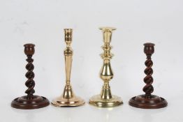 Two George III period brass candlesticks, one of knopped form, each 25.5cm tall, together with a