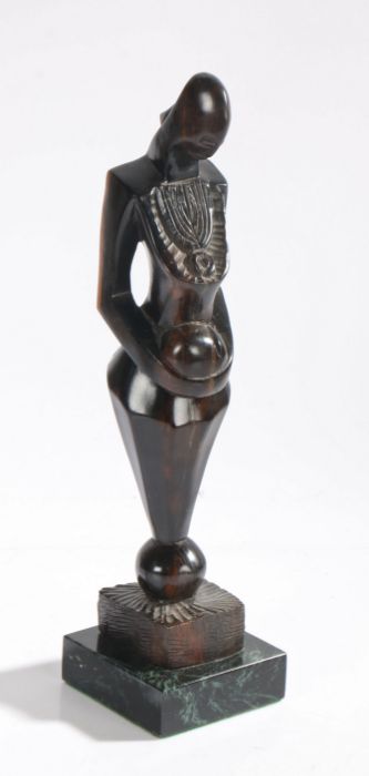 Mid 20th century African macassar ebony fertility figure, possibly Makonde (Tanzania), on a black - Image 3 of 4