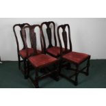Set of four Hewetson Milner & Thexton Ltd, 20th century carved oak dining chairs, each decorated