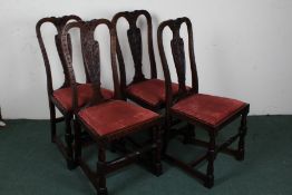 Set of four Hewetson Milner & Thexton Ltd, 20th century carved oak dining chairs, each decorated