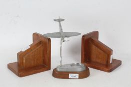 A Spitfire ashtray together with a pair of book ends, 22cm high