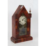 19th century mahogany cased mantle clock of architectural arched form, with a white dial and Roman