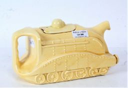 An Art Deco novelty "Mallard" stream train tea pot, the cream tea pot with chip to lid, 22cm wide