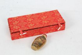 Hand painted Chinese snuff bottle depicting a exterior scene, housed within a box