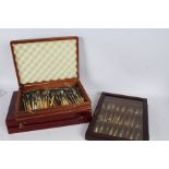 Collection of pickle forks, housed in three wooden cases (qty)