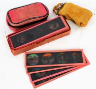 Sixteen long magic lantern slides 'Voyage to India', boxed, together with a pair of Edwardian